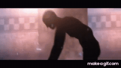 Silhouette Of Man In Checkered Floor Room GIF