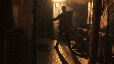 Silhouette Of Man In Dark Room With Dvo GIF