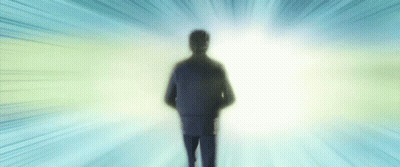 Silhouette Of Man In Front Of Bright Light GIF
