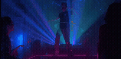 Silhouette Of Man In Front Of Crowd In Club GIF