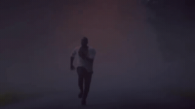 Silhouette Of Man Running In Foggy Forest GIF