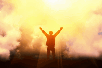 Silhouette Of Man With Arms Outstretched In Front Of Sun GIF