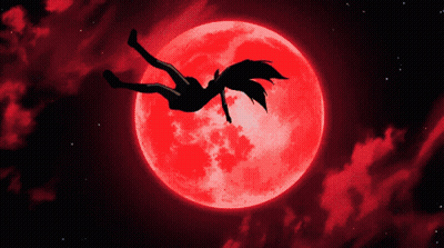 Silhouette Of Person Falling In Front Of Red Full Moon GIF