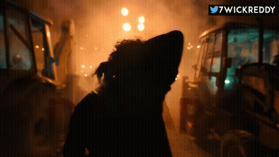 Silhouette Of Person In Dark Room With 7Wickreddy GIF