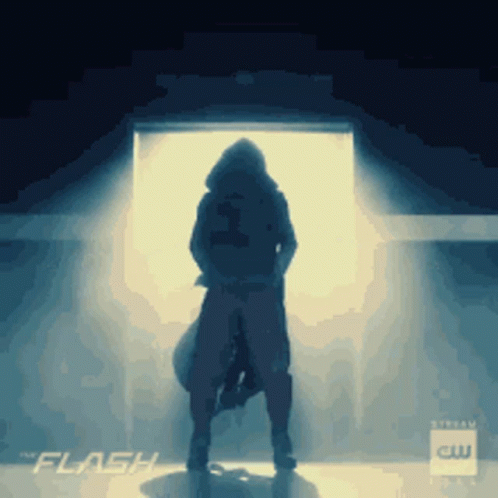 Silhouette Of Person In Doorway With Flash GIF