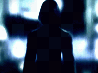 Silhouette Of Person With Hood GIF