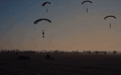 Silhouette Of Soldier Holding Rifle GIF