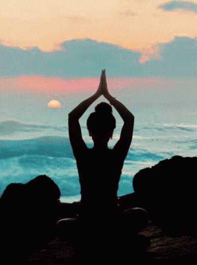 Silhouette Woman Meditating In Lotus Position GIF