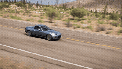 Silver Car Driving On Road With Yellow Line GIF