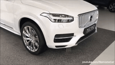 Silver Car Front With Steering Wheel GIF