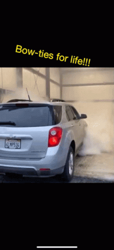 Silver Car With License Plate MP53L Being Washed GIF