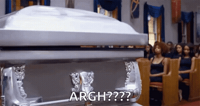 Silver Coffin In Church With Women GIF