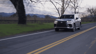 Silver Lexus Driving Down Mountain Road GIF