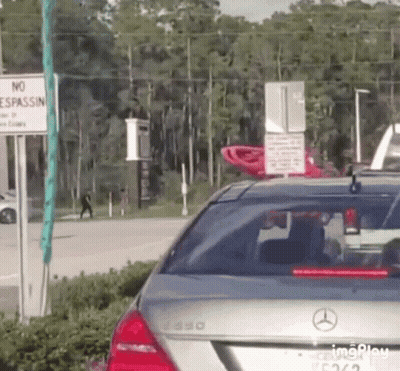 Silver Mercedes Parked In Front Of No Espassin Sign GIF