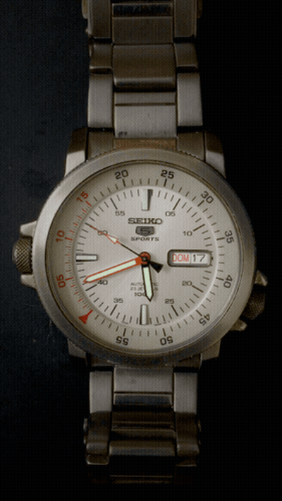 Silver Seiko Sports Watch With White Face GIF