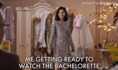 Silver Sequined Woman Getting Ready To Watch Bachelorette GIF