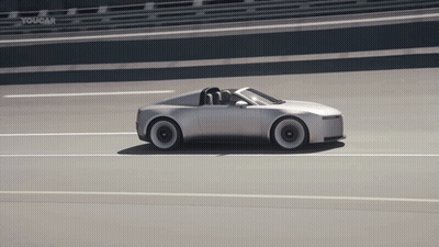 Silver Sports Car Driving Down Highway With Youcar Sign GIF