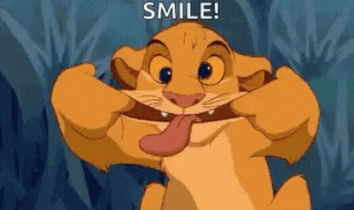 Simba From The Lion King Is Smiling With His Tongue Out . GIF