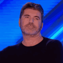 Simon Cowell Resting His Tired Blinking Eyes GIF