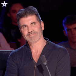 Simon Cowell Wink Wink GIF
