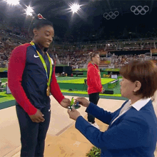 Simone Biles Gold Medal Hand Shake Congratulations
