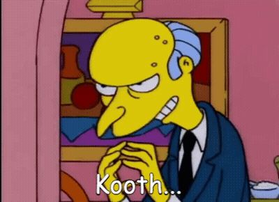 Simpsons Character Sitting Hands Folded Says Kooth