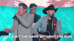 Singing Coke Aint Same Without Rum GIF