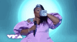 Singing Lizzo Gulp While Seating GIF