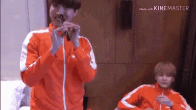 Singing Man Orange Jacket Microphone Another Man GIF