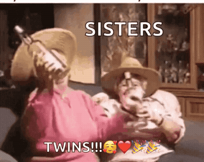 Sisters Twins Sitting On Couch GIF