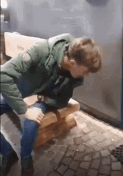 Sitting Boy Puking GIF