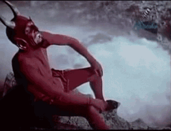 Sitting Devil Looking Up GIF