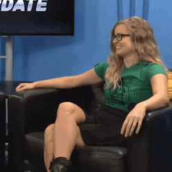 Sitting Girl Playing Smallest Violin GIF