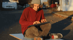 Sitting Man Doing Fast Typing GIF