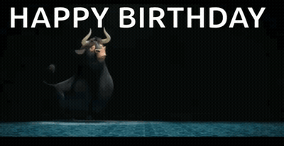 Sitting Man Holding Sparkler Saying Happy Birthday Travis GIF