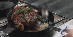Sizzling Meat Perfection In Pan GIF