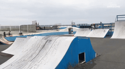 Skateboarder Doing Trick On Ramp GIF