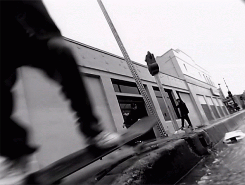 Skateboarding Person In Front Of Building GIF