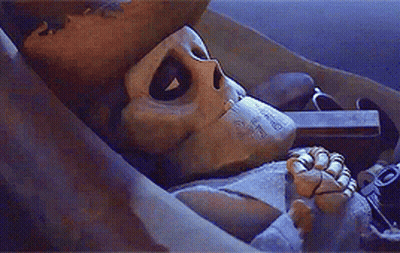Skeleton Laying In Box Saying Those Aren't The Words GIF