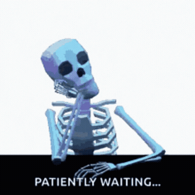 Skeleton Patiently Waiting At Table GIF