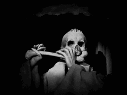 Skeleton Playing Flute With Bones