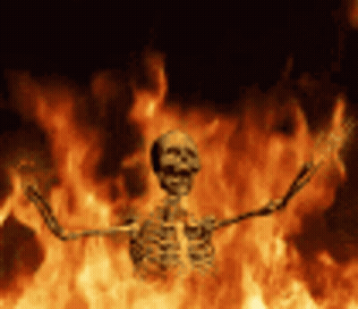 Skeleton Standing In Fire With Outstretched Arms GIF