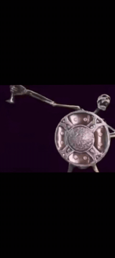 Skeleton Statue Holding Shield And Sword GIF
