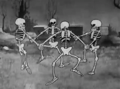 Skeletons Holding Hands Dancing In A Circle GIF