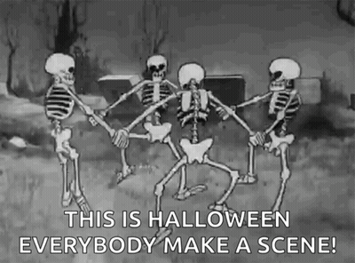 Skeletons Holding Hands In Circle In Cemetery GIF