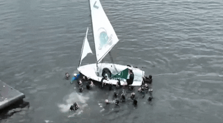 Skiff People Raise Flag GIF