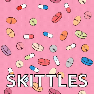 Skittles On Pink Background GIF