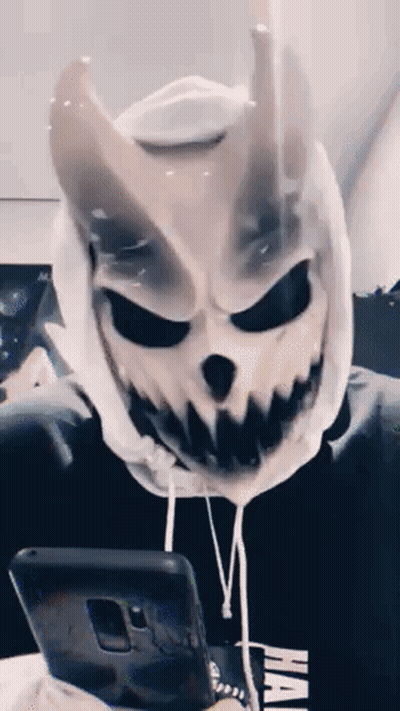 Skull Mask Person On Couch Phone GIF