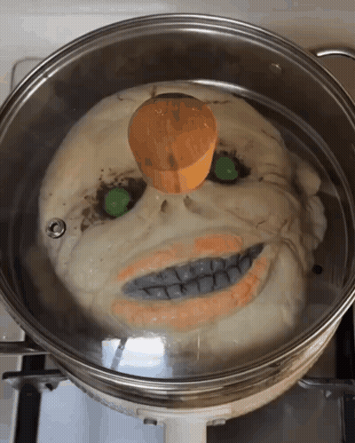 Skull-Shaped Food Pot With Wooden Lid GIF