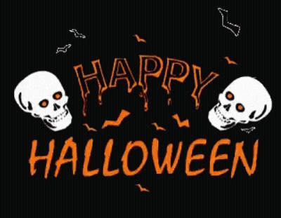 Skull Shaped Pumpkin In Grass GIF